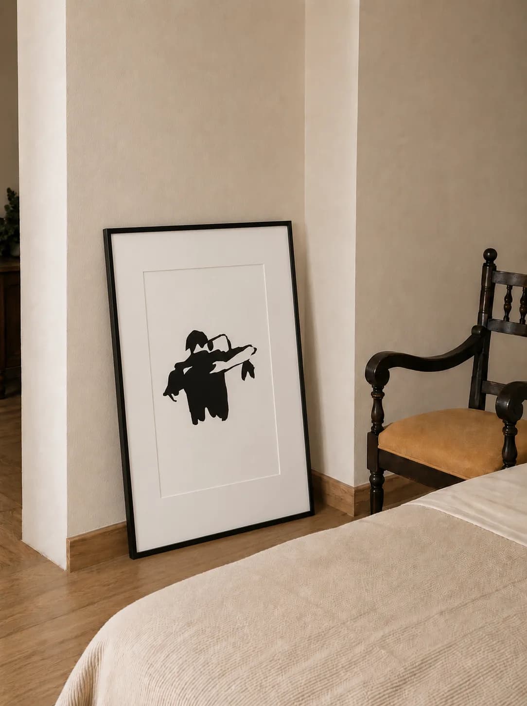 Abrazo, encadrée dans un intérieur